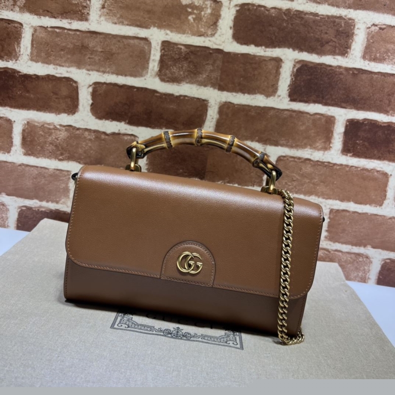 G*u*i top handle bags